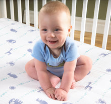 Load image into Gallery viewer, Blue Jungle Animals Muslin Fitted Crib Sheet
