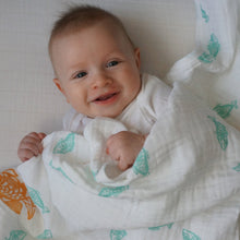 Load image into Gallery viewer, Teal Goldfish Muslin Swaddle Blanket: made with 100% Organic Cotton Muslin. (extra large 47&quot;x47&quot;)
